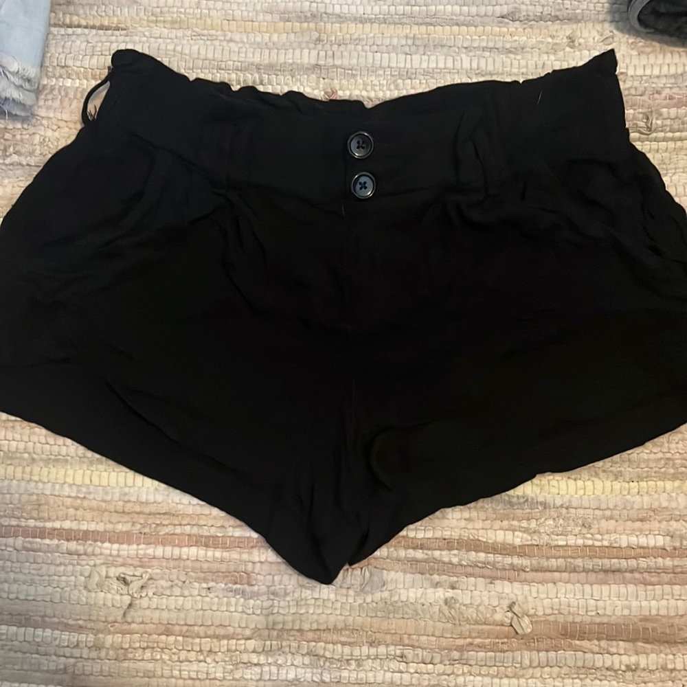 the buttons don't undo, but the waist is really stretchy